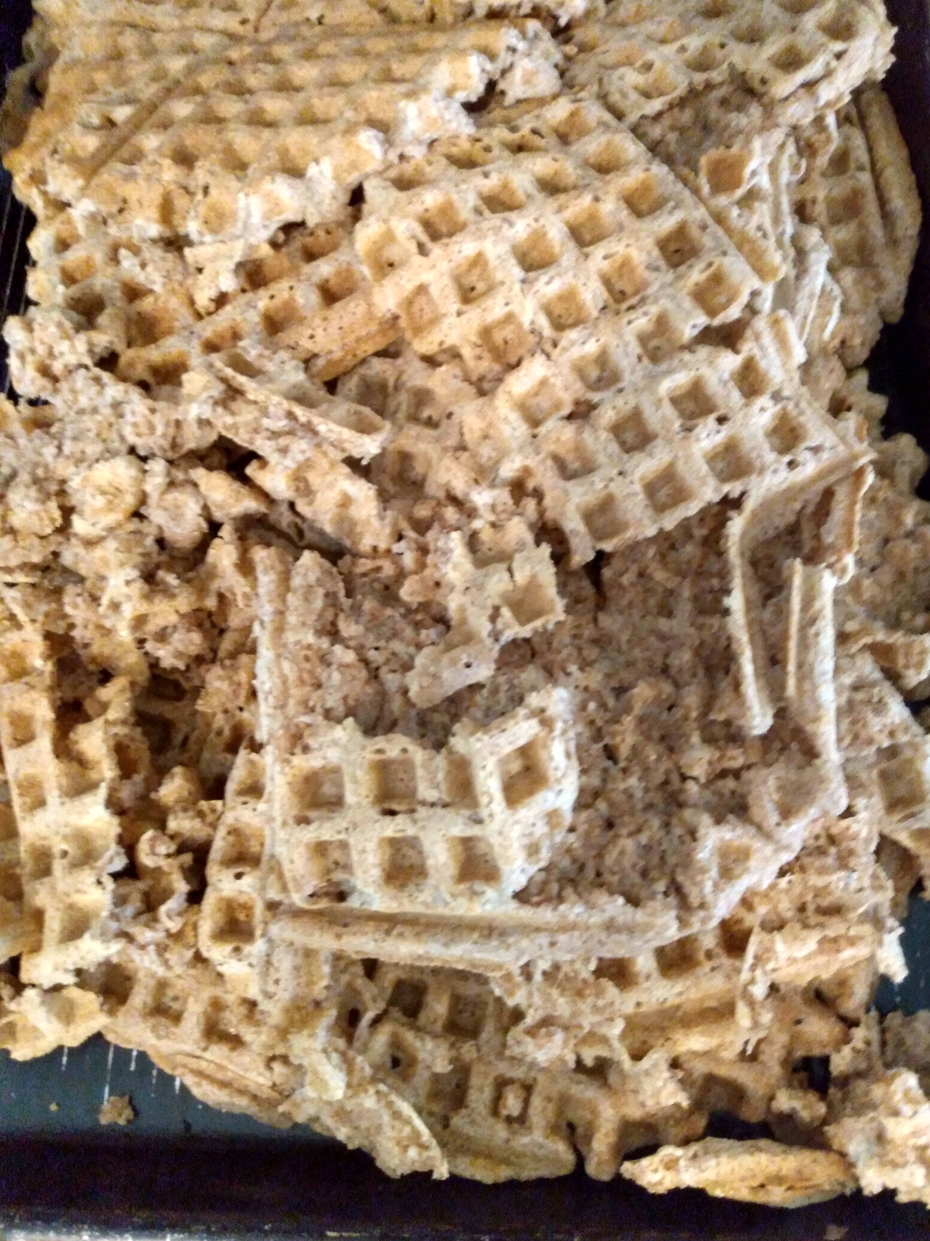 Pile of broken homemade waffles.